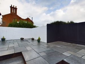 Rear paved courtyard- click for photo gallery